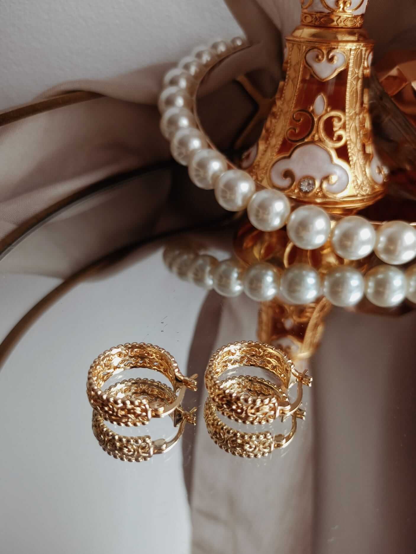 Kolczyki okrągłe – ponadczasowa elegancja i delikatny blask - 2